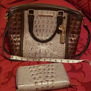 Used with matching wallet and dust bag